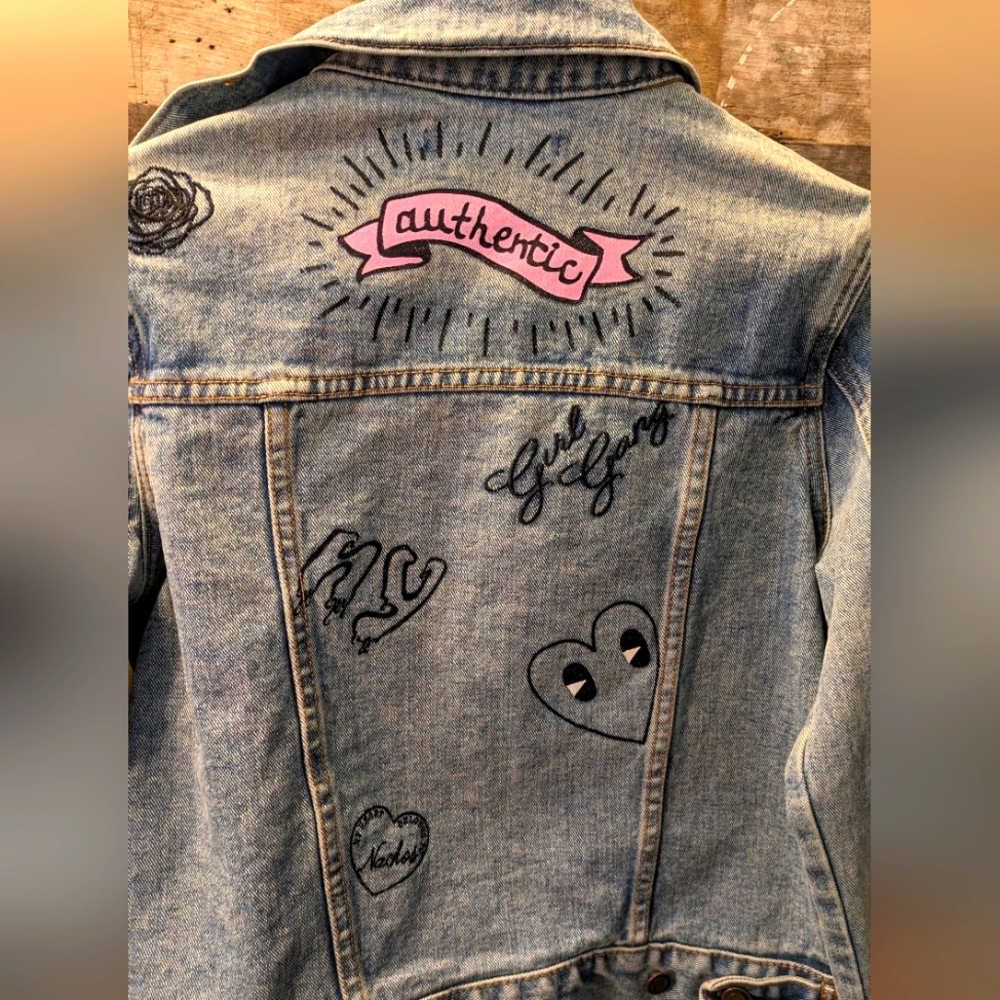 Graphic denim jacket.    S/M